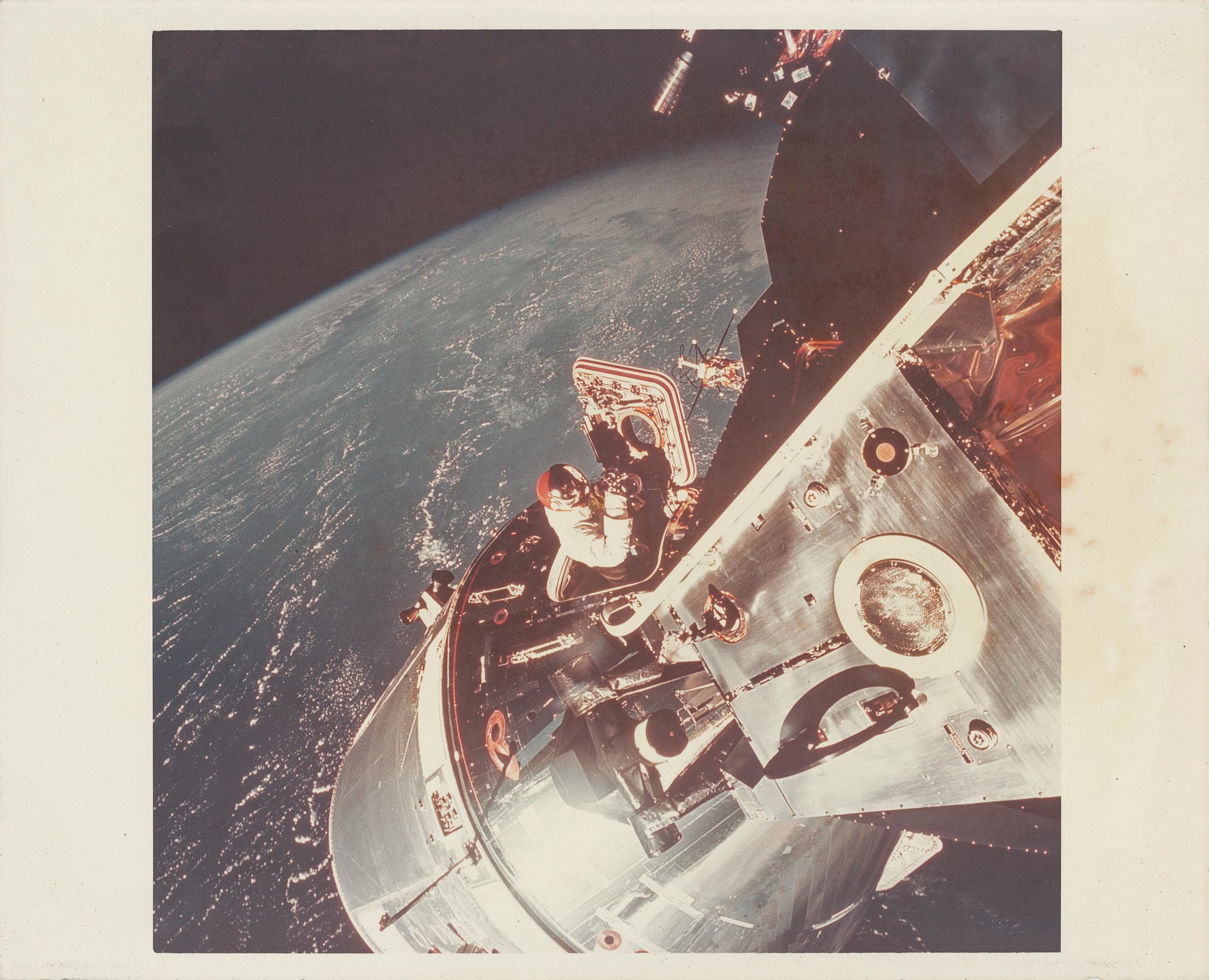 Russell Louis Schweickart | David Scott in the spacecraft hatch above ...