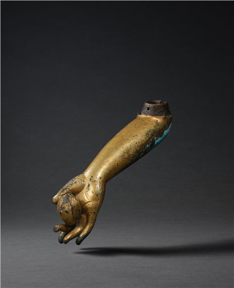 A GILT-BRONZE FRAGMENT OF A RIGHT ARM by Chinese School