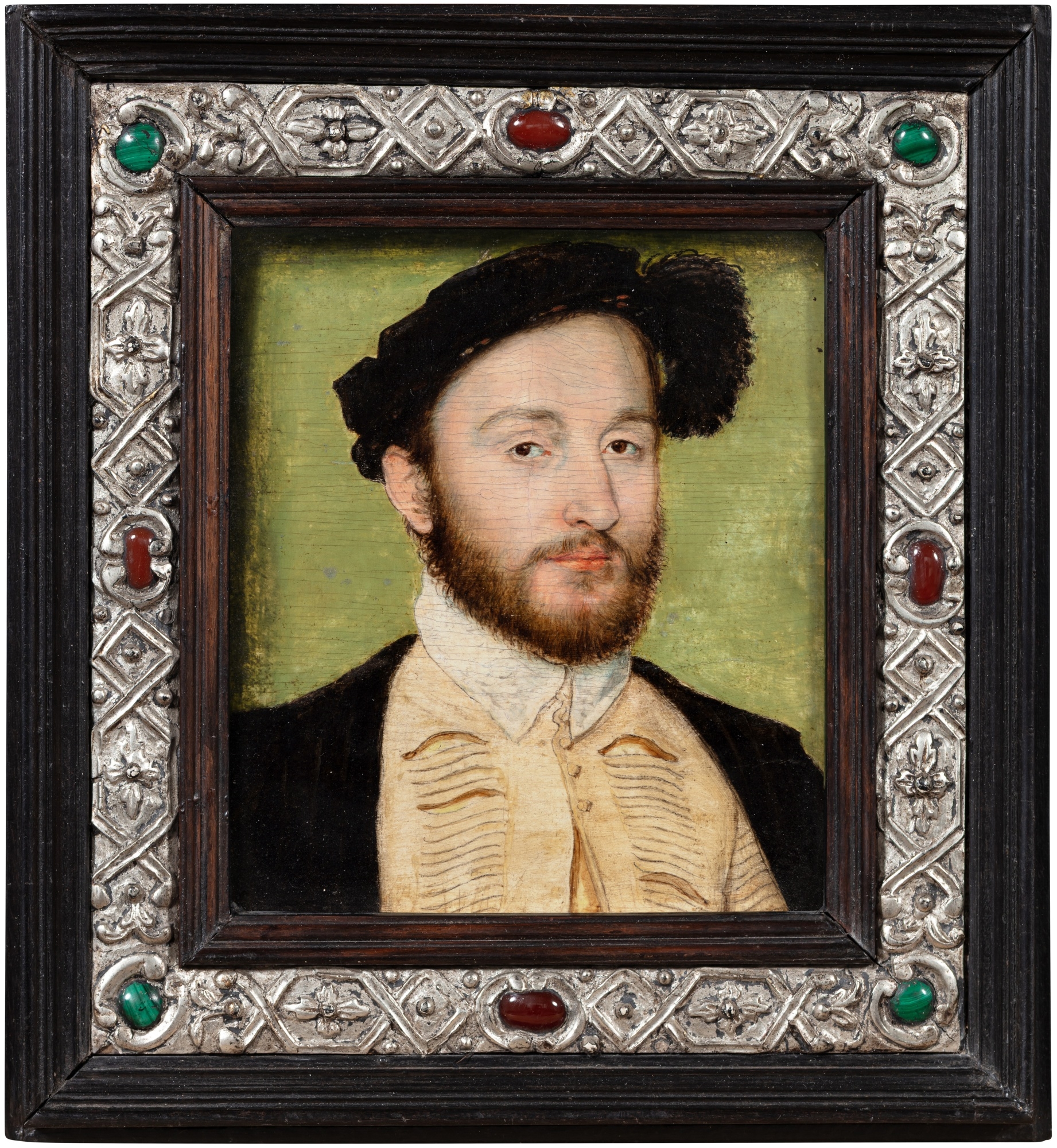 Artwork by Corneille de Lyon, Portrait of Charles de La Rochefoucauld (1525–1562), bust-length, wearing a slashed doublet, black coat and feathered cap, Made of oil on oak panel