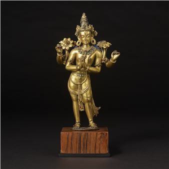 A GILT COPPER ALLOY FIGURE AVALOKITESHVARA - Nepalese School, 13th Century