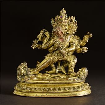 A GILT COPPER ALLOY FIGURE OF MAHOTTARA HERUKA - Nepalese School, 13th Century