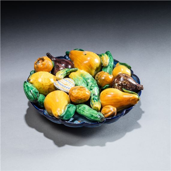 A trompe-l’œil lobed moulded bowl with fruits - Italian School, 16th Century