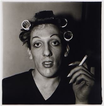 A young man in curlers at home on West 20th Street, N. Y. C - Diane Arbus