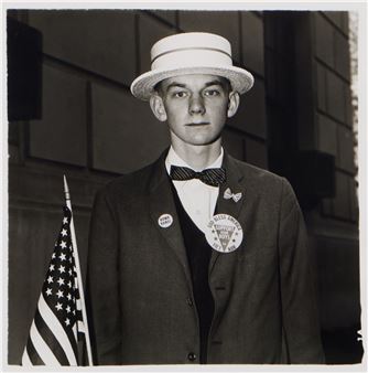 Boy with a straw hat waiting to march in a pro-war parade, N. Y. C - Diane Arbus