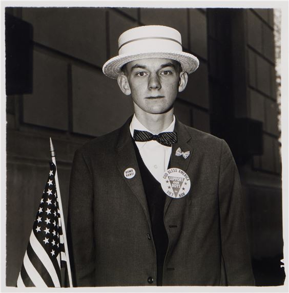 Boy with a straw hat waiting to march in a pro-war parade, N. Y. C