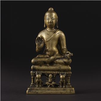 A SILVER INLAID BRASS FIGURE OF BUDDHA - Kashmir School, 8th Century