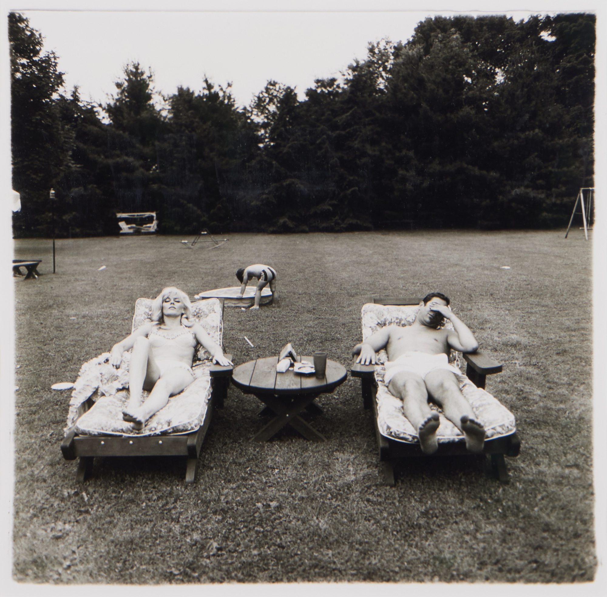 Artwork by Diane Arbus, A family on the lawn one Sunday in Westchester, N. Y, Made of gelatin silver print, a plate from A Box of Ten Photographs