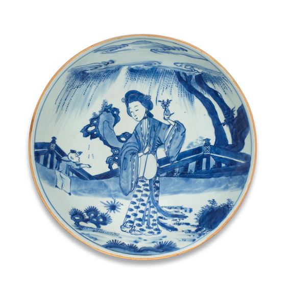 A LARGE BLUE AND WHITE 'LADY AND BOY' SAUCER-DISH
