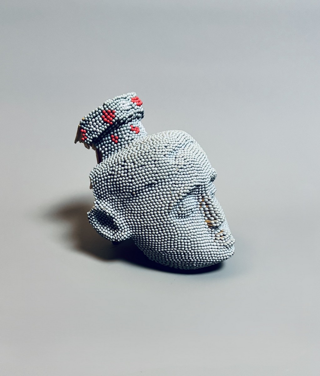 Artwork by David Mach, African mask, Made of Matchsticks