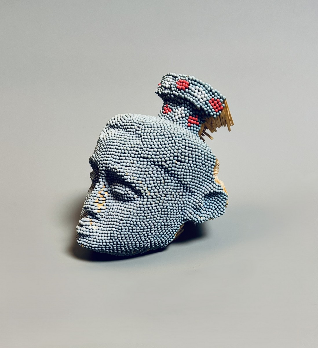 Artwork by David Mach, African mask, Made of Matchsticks