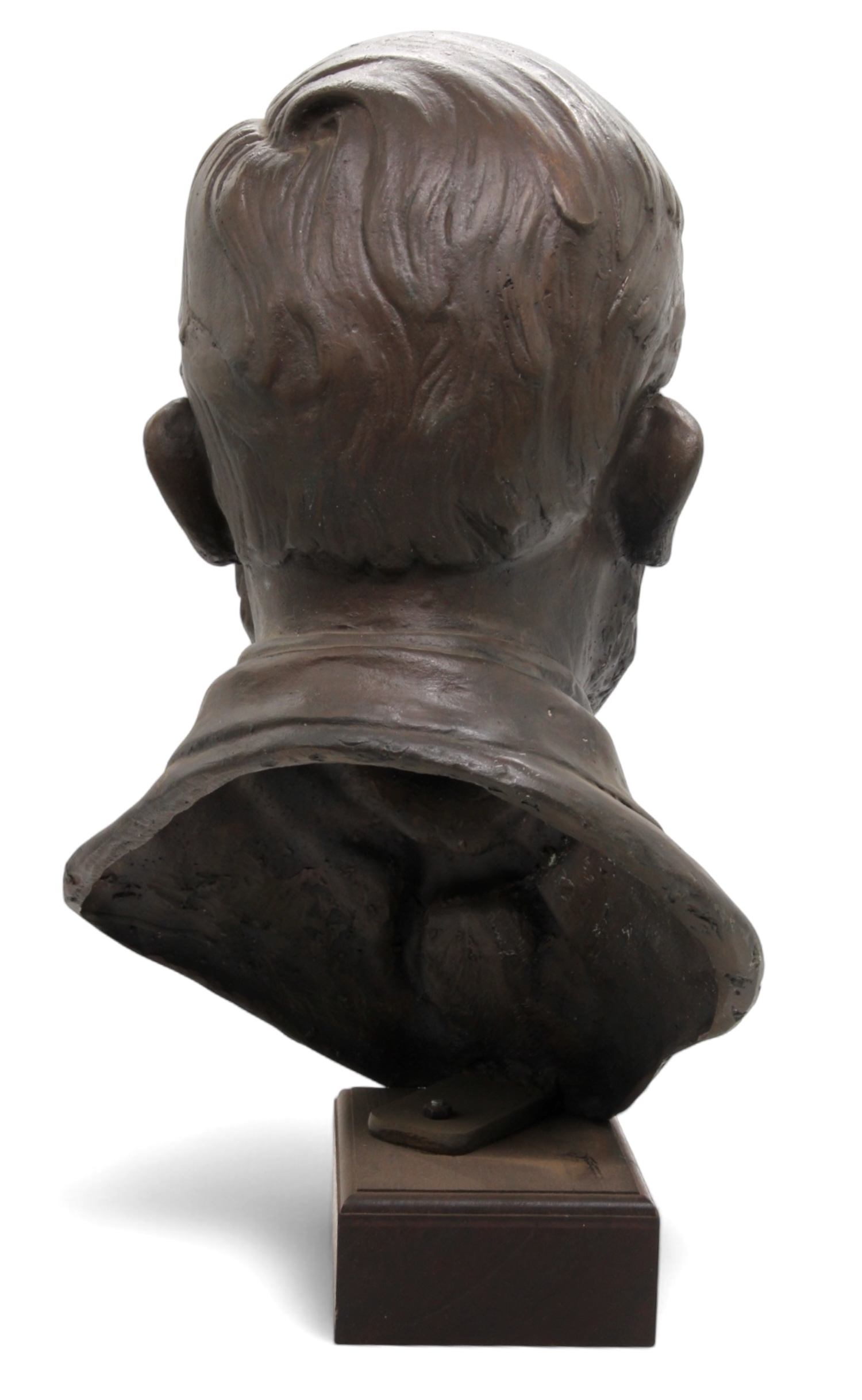 A bronze bust of a bearded man with a solemn expression, mounted on a dark rectangular base.