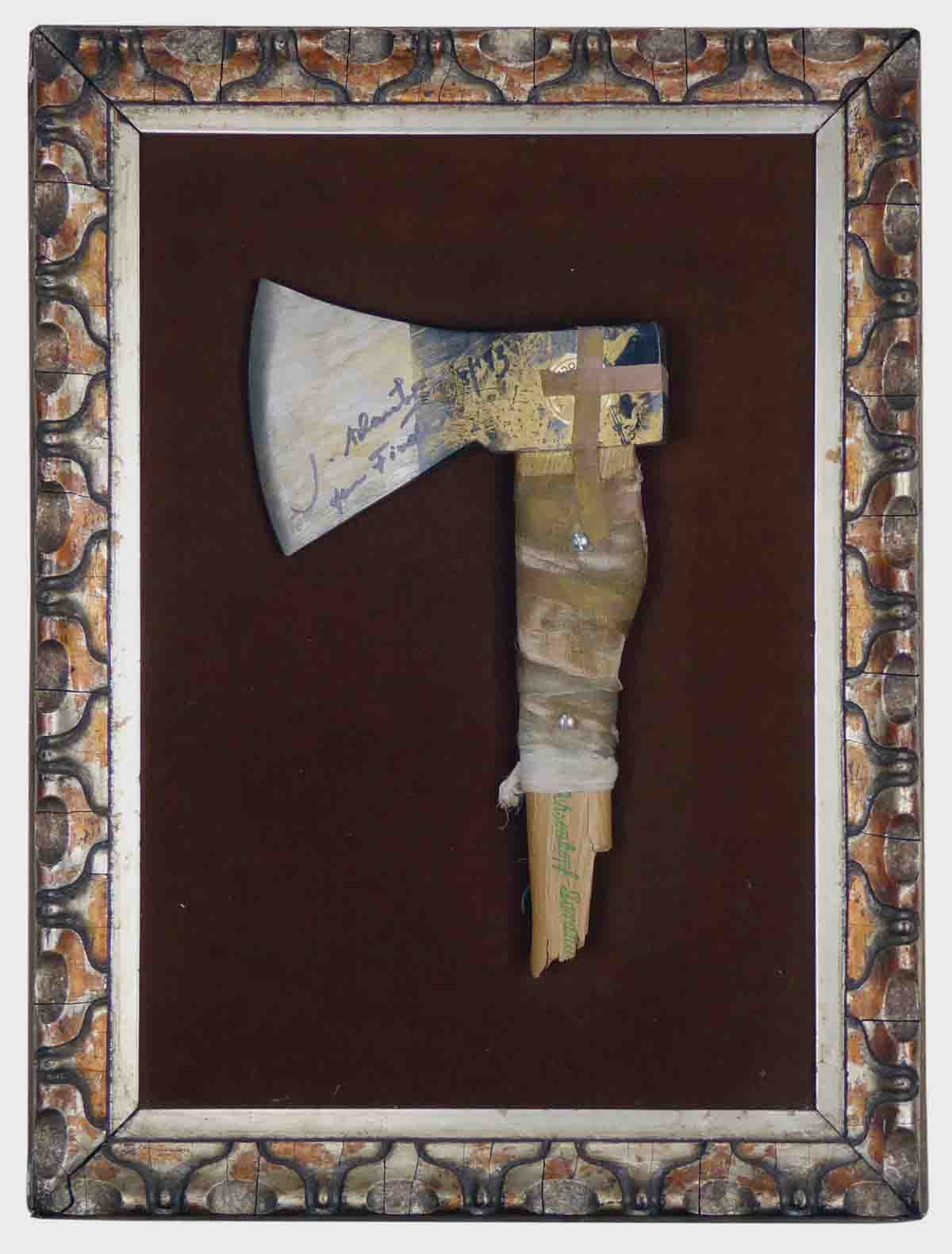 Artwork by Jürgen Klauke, Im Schatten des Domes (Ritual Trinken, Made of Assemblage: Mit Mullbinde und Hansaplast bandagiertes Axtfragment