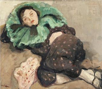 Reclining female model in a dotted suit and a large green collar - Carl Fischer