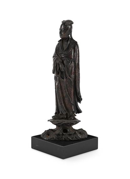 A Chinese bronze figure of Lu Dongbing by Chinese School, Ming Dynasty