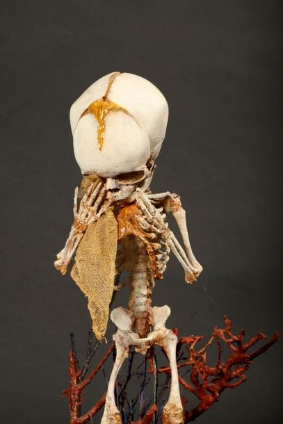 Artwork by Michel de Spiegelaere, Weeping vanity, Made of Resin, Composite Materials on a blackened wood base with coral-red resin decoration