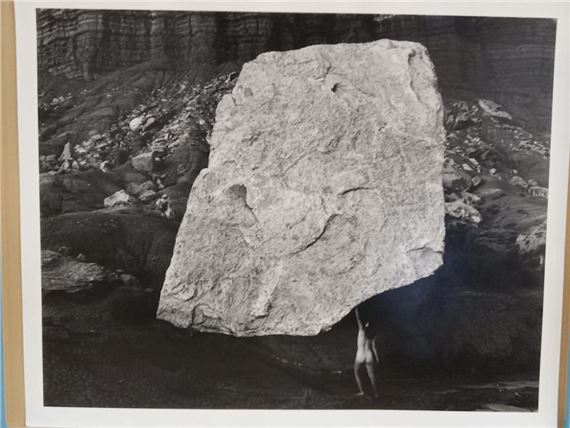SELF-PORTRAIT, HOLDING UP ROCK - Judy Dater
