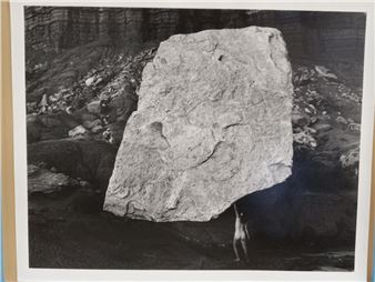 SELF-PORTRAIT, HOLDING UP ROCK - Judy Dater