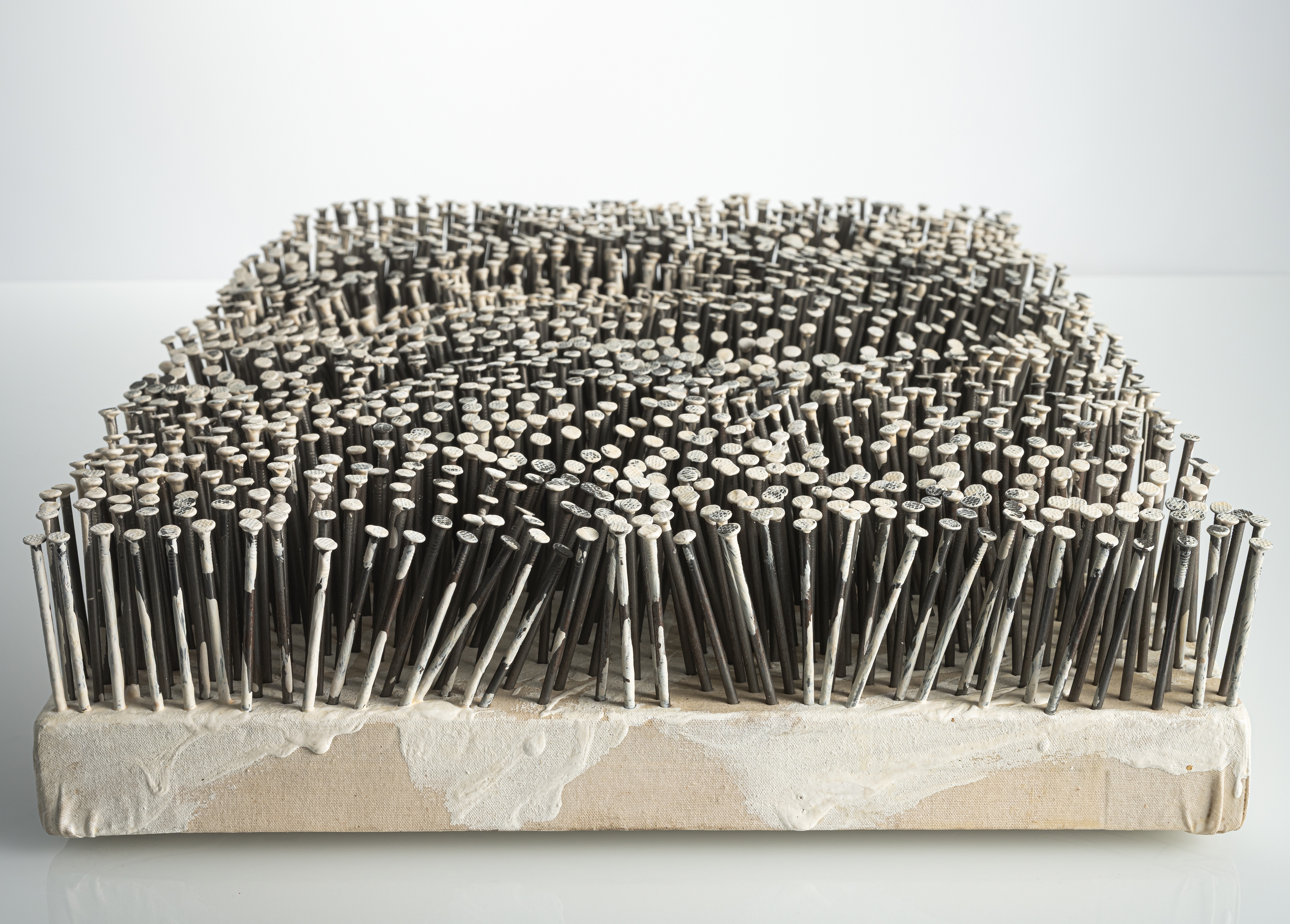 Artwork by Günther Uecker, Feld, Made of Nails And White Paint On Canvas, On Wood