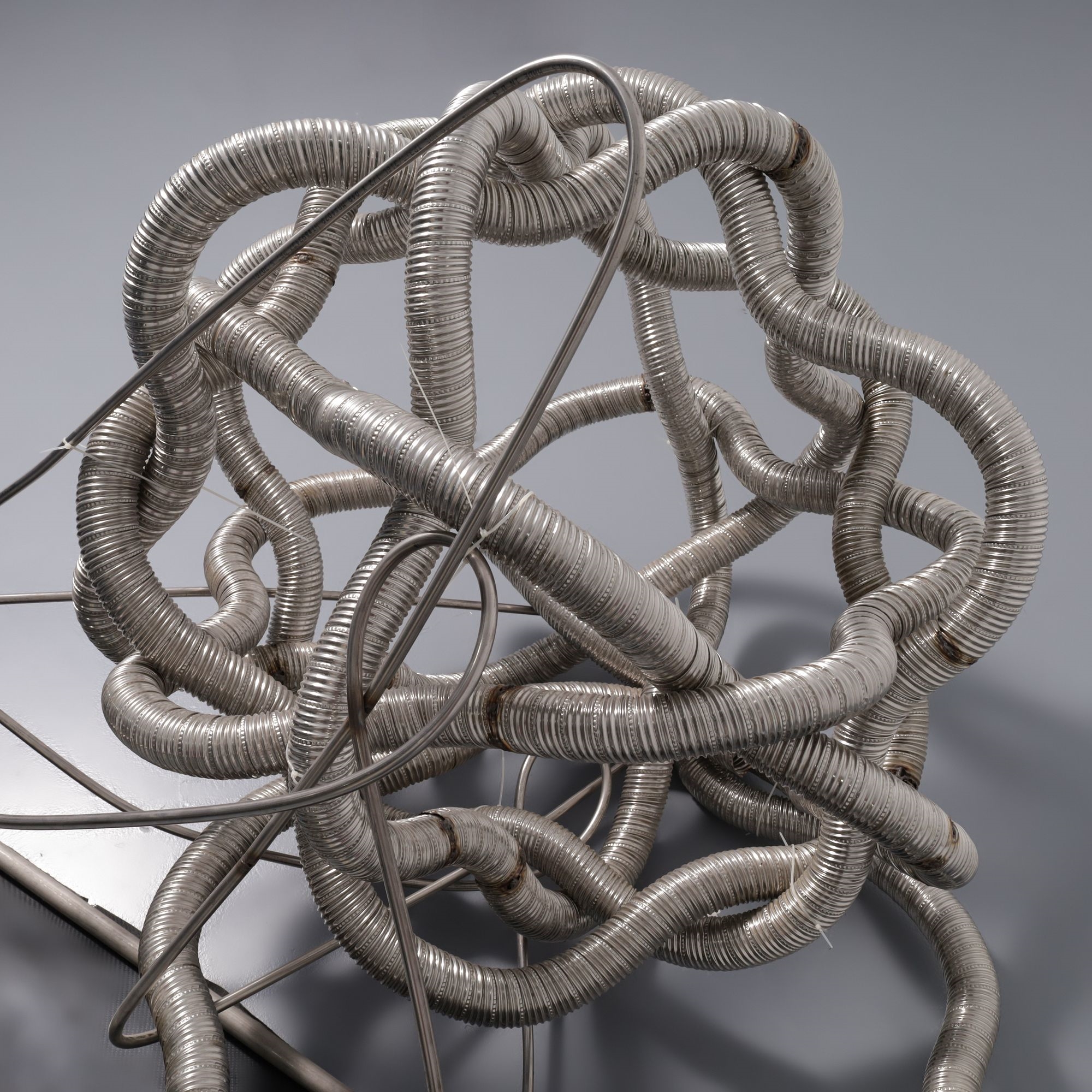 Artwork by Frank Stella, KAPAR Sculpture, Made of Stainless Steel, Unpainted Bent Tubing, Aluminum, Fiberglass