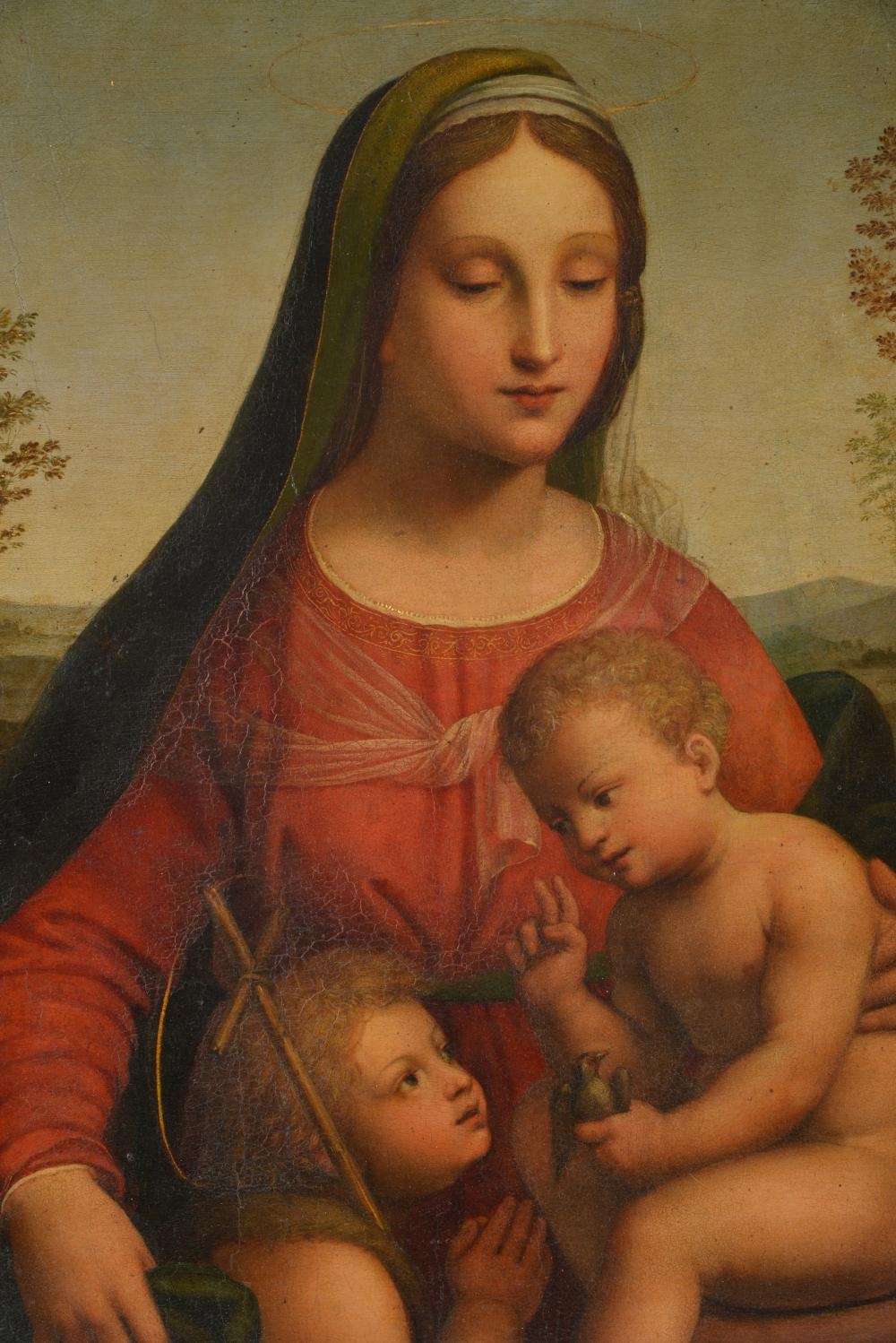 Artwork by Italian School, 17th Century, Madonna with Jesus holding a finch and St. John with the cross in landscape, Made of Oil On Wooden Panel