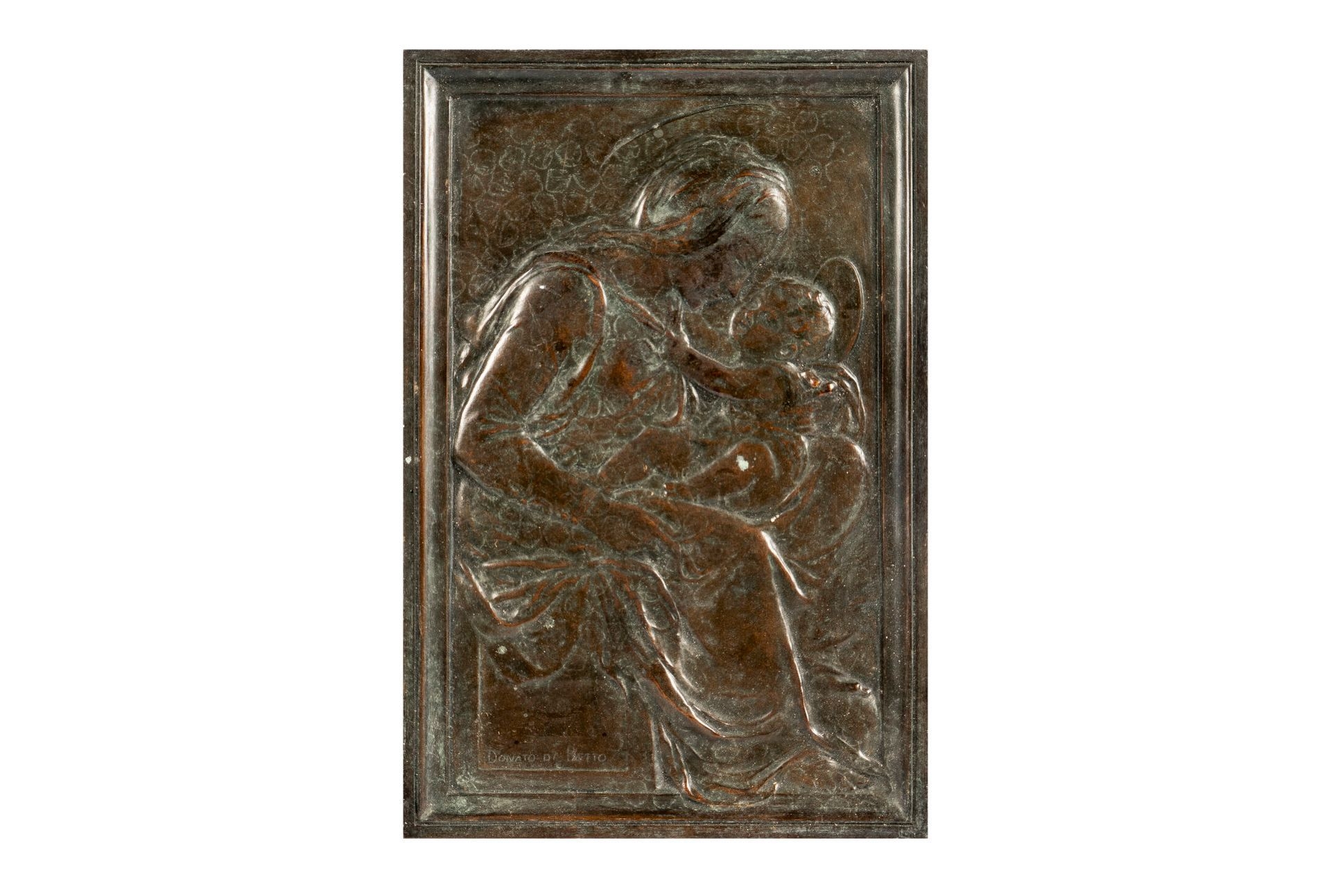 Artwork by Donatello, Bronze plaque with shaded brown patina depicting a Madonna of Tenderness in flattened form, Made of Bronze