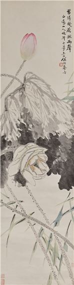A vertical ink painting of a blooming lotus flower with bamboo stalks and calligraphy.