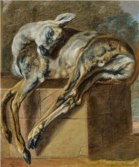 A dead deer on a stone pedestal