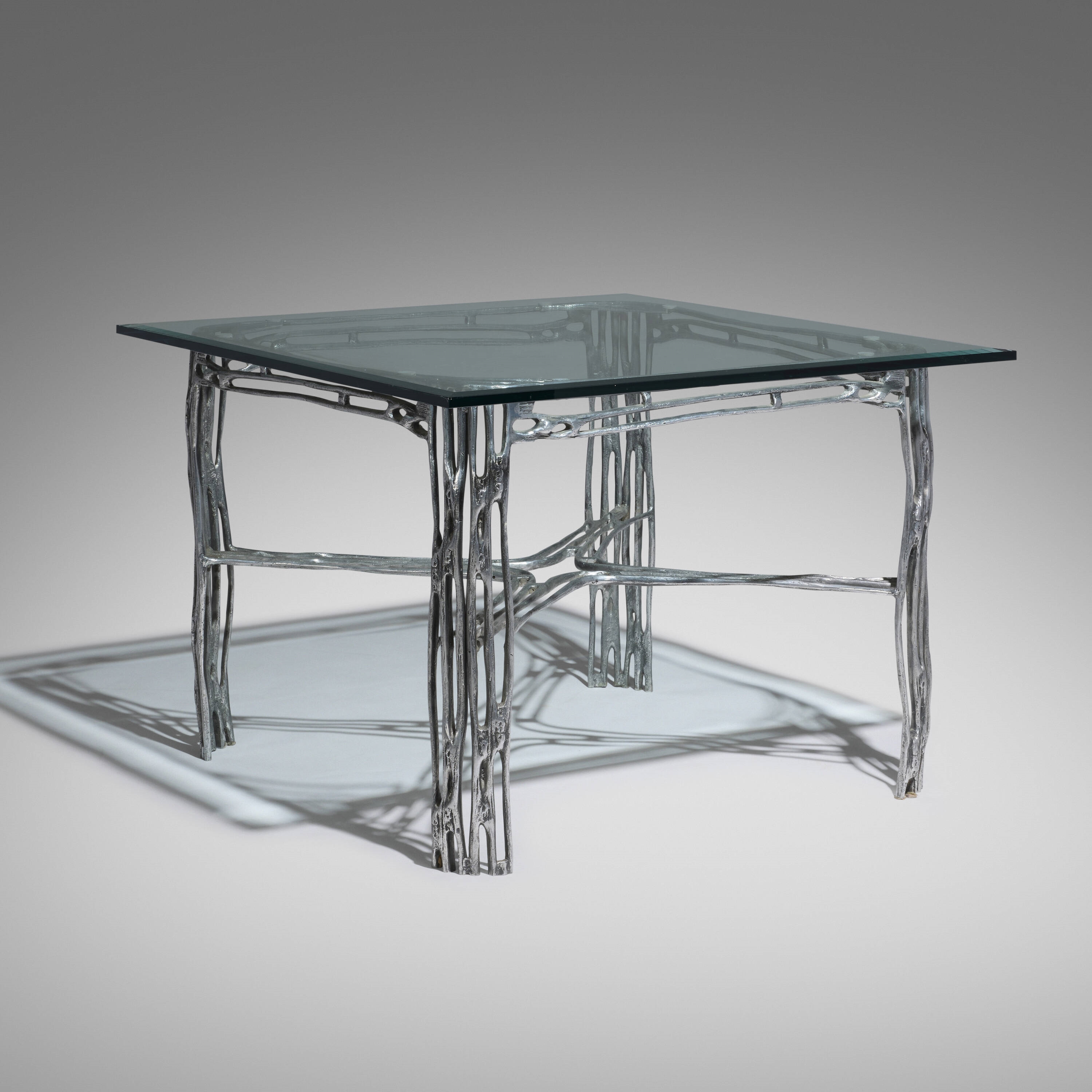 Artwork by Arthur Court, Saguaro table, Made of cast aluminum, glass