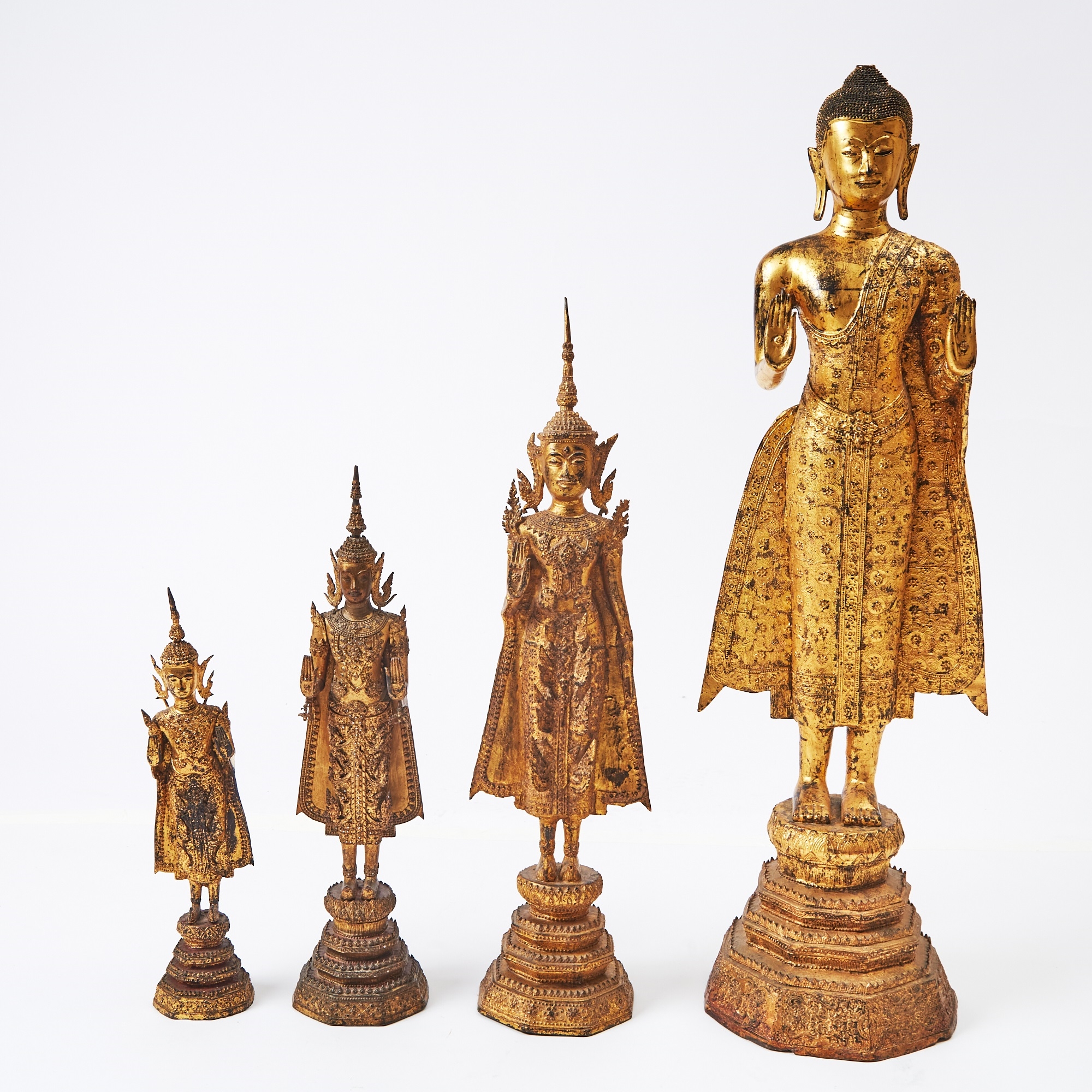 Artwork by Thai School, 19th Century, Group of Four Thai Gilt Bronze Buddhas, Made of Bronze