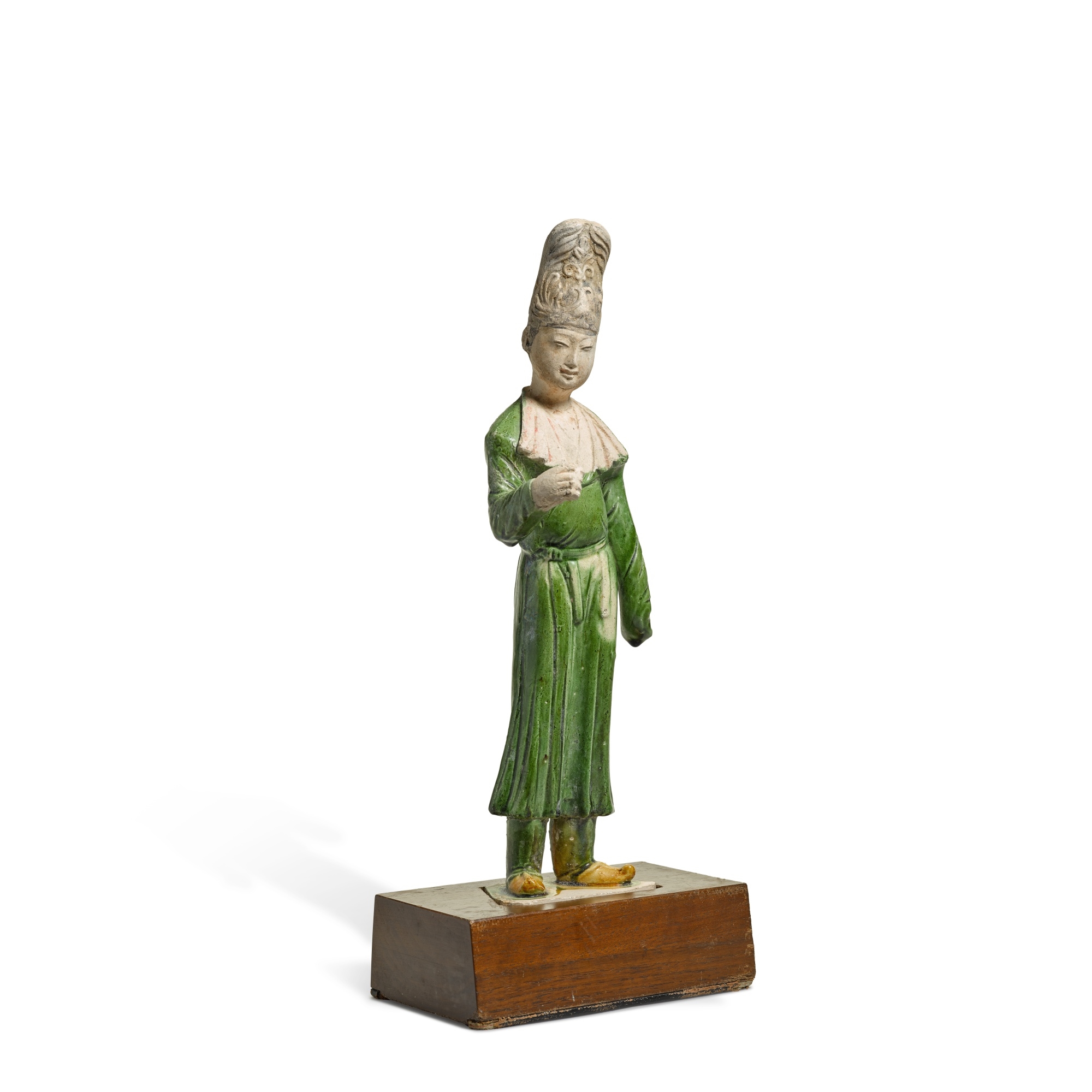 Artwork by Chinese School, A figure of an official, Made of Green-glazed pottery on wood stand