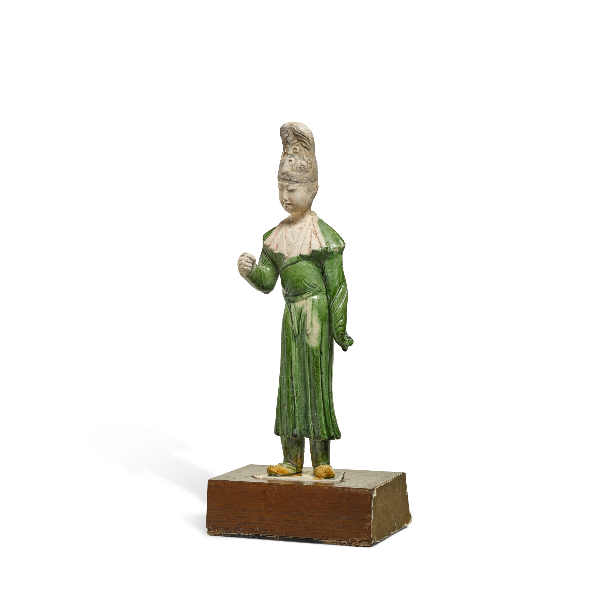 Artwork by Chinese School, A figure of an official, Made of Green-glazed pottery on wood stand