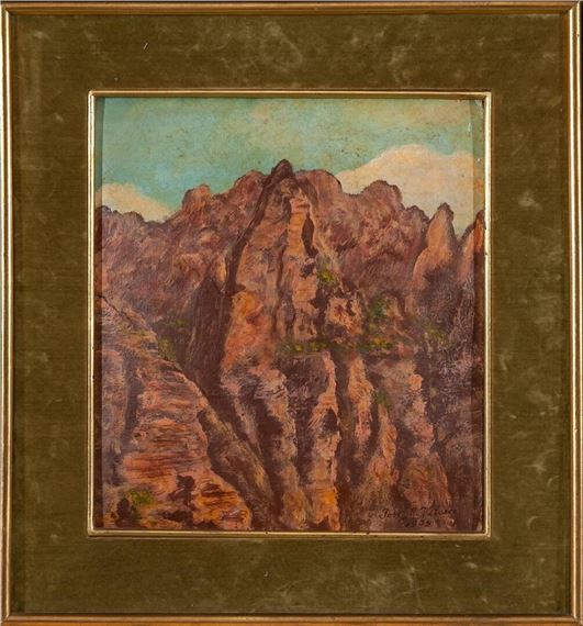 A framed landscape painting of a rugged canyon with layered rock formations under a pale sky.