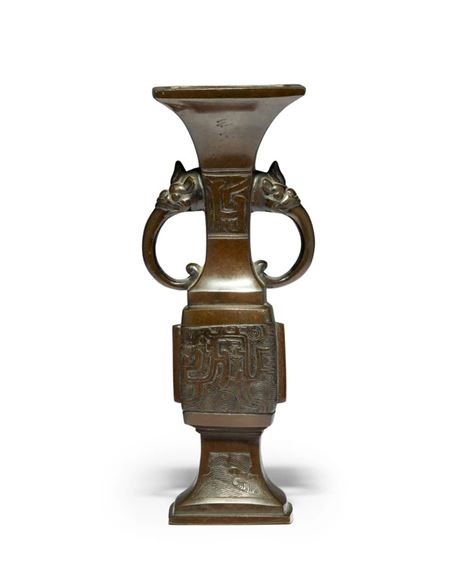 A Chinese bronze two-handled vase by Chinese School, Yuan/Ming dynasty