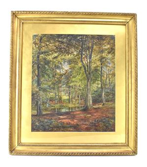 A framed landscape painting of a sunlit forest with a small pond.