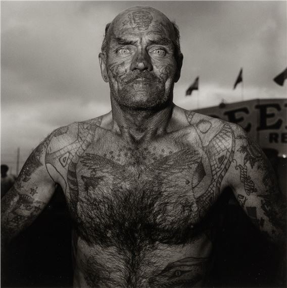 Tattooed Man at a Carnival, MD. by Diane Arbus, Executed in 1967