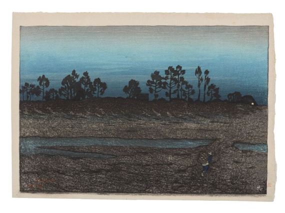 A moody landscape print of a dark, textured field with silhouetted trees under a blue sky.