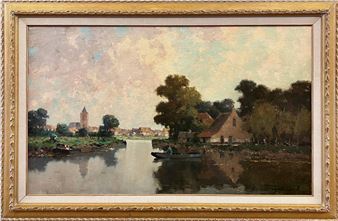 River view with a farm and village in the background