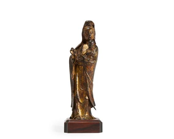 A Chinese gilt-lacquered bronze figure of Guanyin the 'bringer of sons