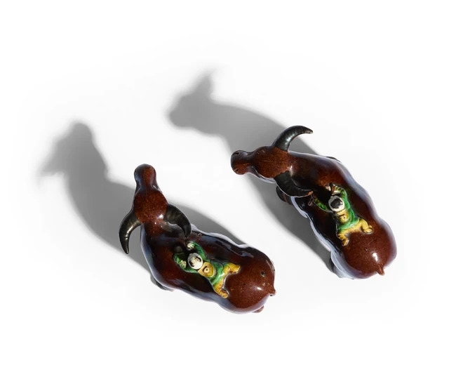 Artwork by Chinese School, A pair of Chinese famille verte biscuit figures of a boy on a buffalo, Made of Biscuit