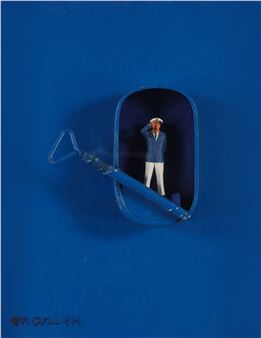 A miniature sailor figure stands inside an open blue tin against a solid blue background.