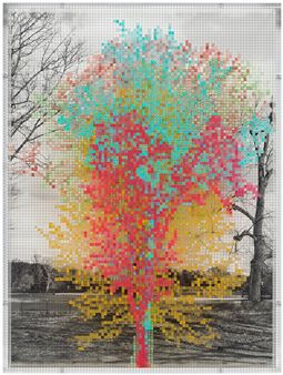 A picture of a colorful tree made out of lego blocks.