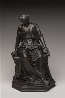 DÉESSE de l'agriculture assise sur un tabouret