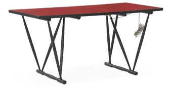 Work table with sculptural V-shaped, black lacquered frame