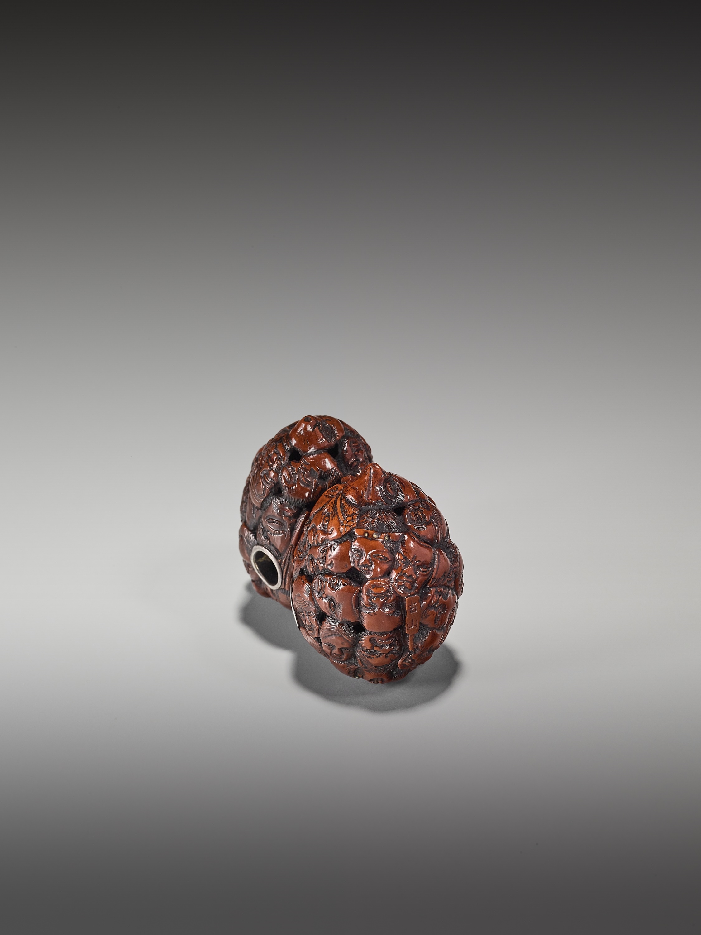 Toryusai Kozan | A RARE DOUBLE NETSUKE WITH A MULTITUDE OF MASK | MutualArt