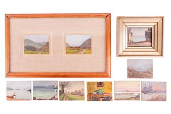A collection of small landscape paintings displayed in various frames and mats.