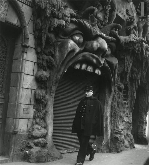 Porte du cabaret de L'Enfer, Boulevard de Clichy, Paris by Robert Doisneau, 1952