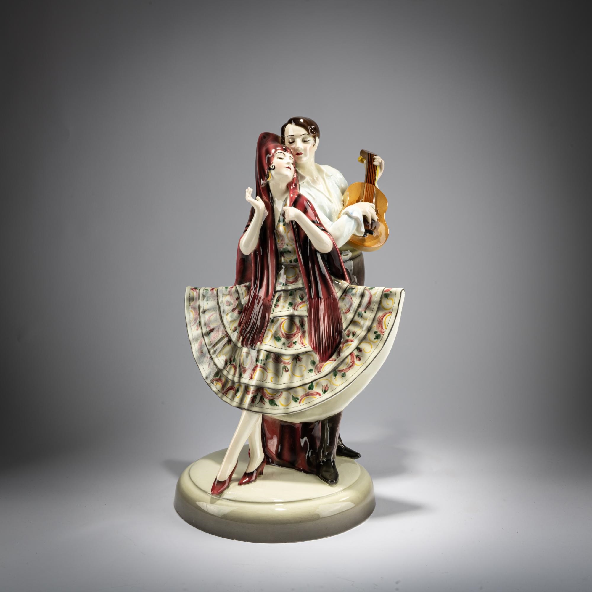Artwork by Josef Lorenzl, Group of standing dancer in fan-shaped dress, behind her a man with a violin, Made of Earthenware, Polychrome Glaze
