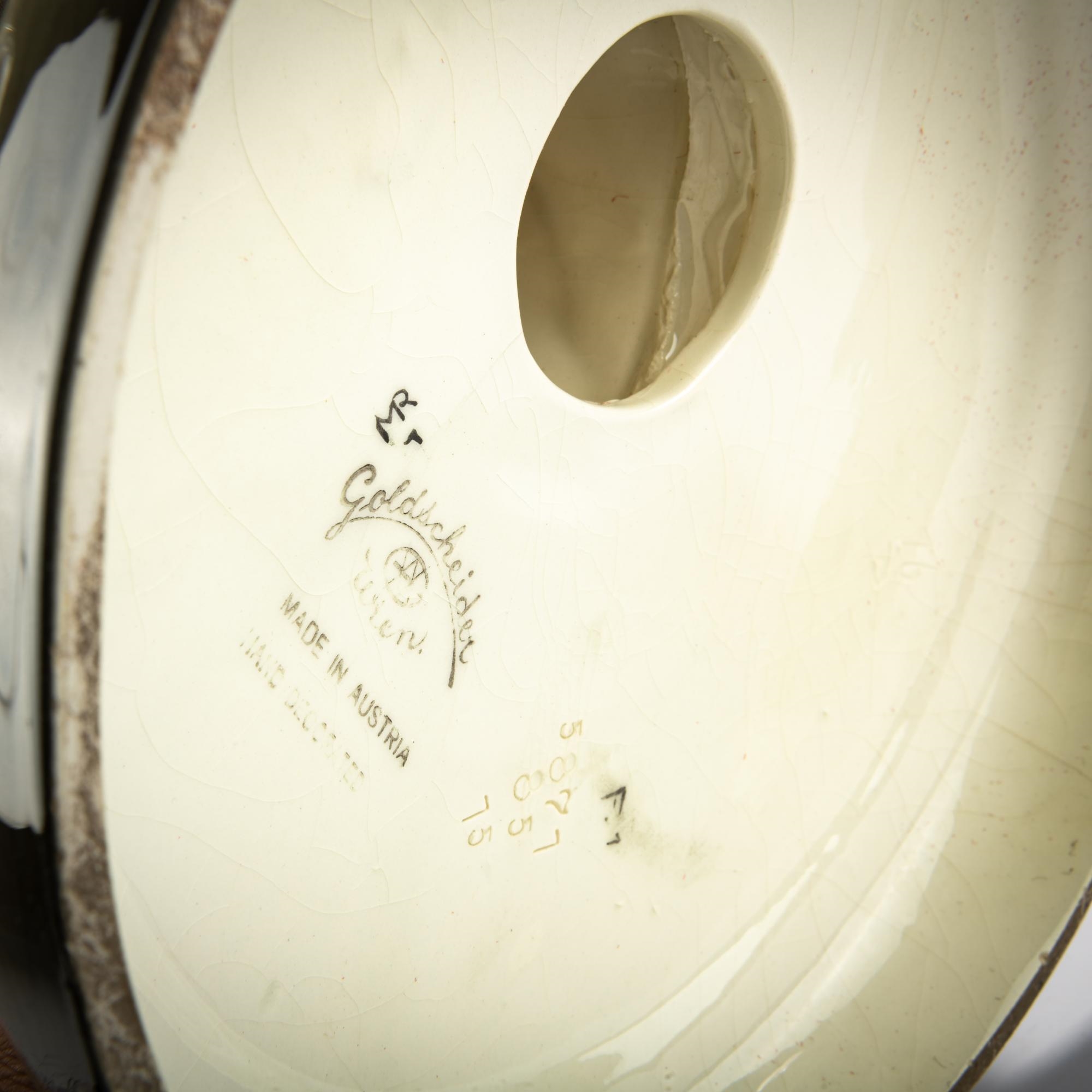 Artwork by Josef Lorenzl, Group of standing dancer in fan-shaped dress, behind her a man with a violin, Made of Earthenware, Polychrome Glaze