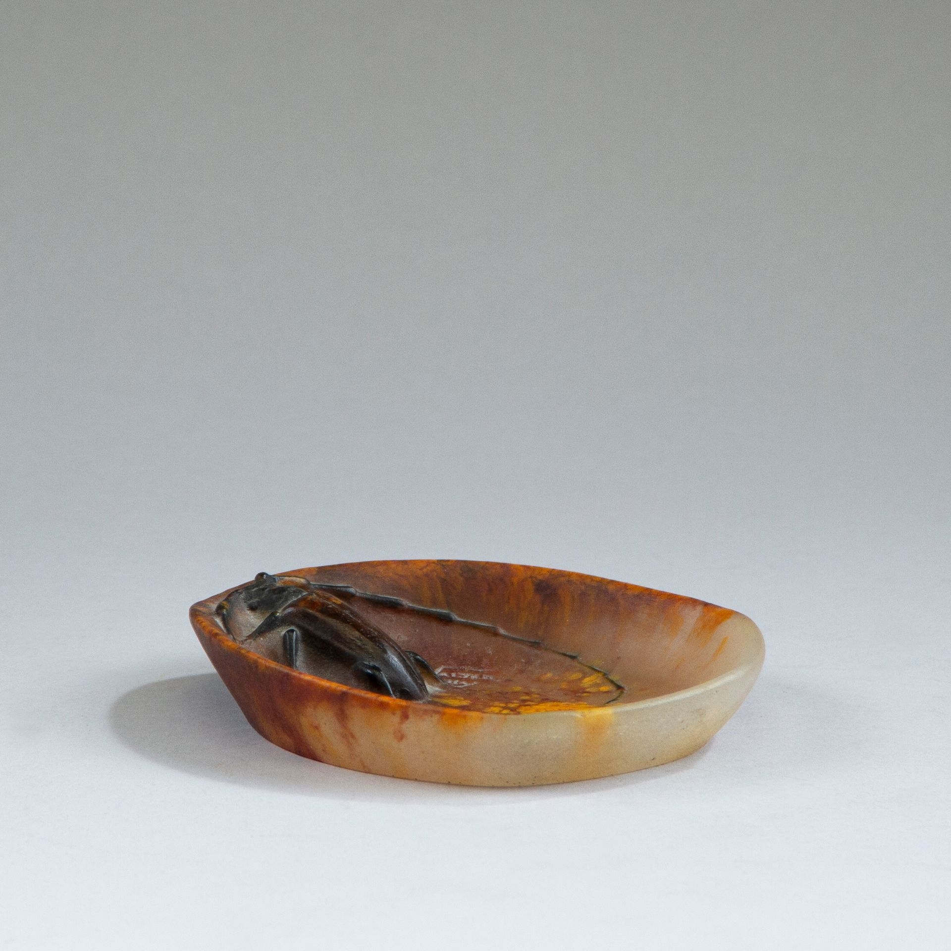 Amalric Walter | Orange and brown pâte-de-glace pocket with relief ...