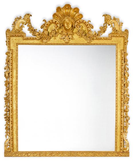 A George II style carved giltwood overmantel frame, in the manner of William Kent, now with a mirror plate - William Kent